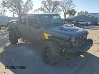 2021 Jeep Gladiator Rubicon с VIN 1C6JJTBM4ML594204, выставлен на аукционе Copart как лот 83998224 с пробегом 25 852 миль миль и Списание • Salvage title. История ставок и продаж доступна на DreamBid. Изображение 4.