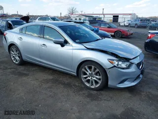 2017 Mazda Mazda6 Touring with VIN JM1GL1V57H1107990, listed as a IAAI auction lot 41887224 with 29,608 mi miles. Bid and sale history available at carsss.com. Image 1.