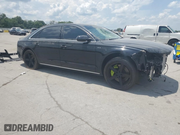2013 Audi A8 6.3L with VIN WAUR4AFD1DN010893, listed as a Copart auction lot 62693655 with 115,085 mi miles and Salvage title. Bid and sale history available at DreamBid. Image 4.