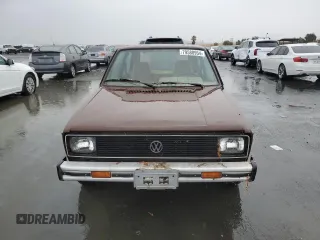 1979 Volkswagen Rabbit z VIN 1793863402, wystawiony jako Copart lot #79580954 z przebiegiem 82 349 mil mil oraz Tytuł czysty. Historia ofert i sprzedaży dostępna na DreamBid. Obrazek 5.