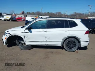 2022 Volkswagen Tiguan SE R-Line Black z VIN 3VV8B7AX4NM027208, wystawiony jako IAAI lot #41729385 z przebiegiem 51 274 mil mil oraz . Historia ofert i sprzedaży dostępna na DreamBid. Obrazek 14.