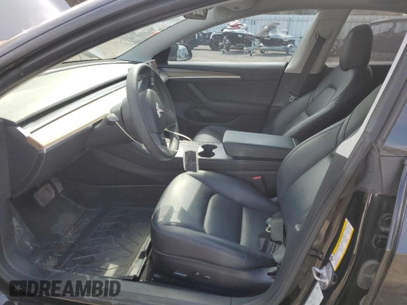 2021 Tesla Model 3 Standard Range Plus with VIN 5YJ3E1EA7MF053663, listed as a Copart auction lot 51982265 with 90,529 mi miles and Salvage Title. Bid and sale history available at DreamBid. Image 7.