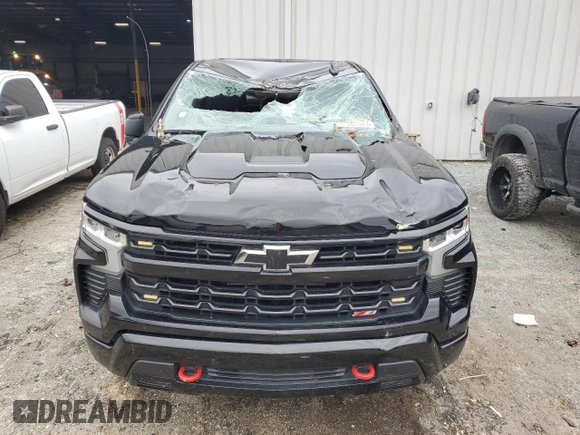 2023 Chevrolet Silverado 1500 LT Trail Boss with VIN 3GCPDFEK7PG106497, listed as a Copart auction lot 75603264 with 28,970 mi miles and Salvage Title. Bid and sale history available at DreamBid. Image 5.
