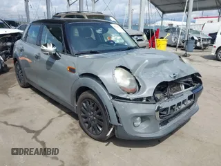 2016 MINI Hardtop 4 Door with VIN WMWXU1C52G2A93506, listed as a IAAI auction lot 41920473 with 101,635 mi miles and . Bid and sale history available at DreamBid. Image 1.