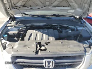 2005 Honda Pilot EX-L z VIN 2HKYF18635H569581, wystawiony jako Copart lot #57295595 z przebiegiem 209 697 mil mil oraz Szkoda całkowita • Salvage title. Historia ofert i sprzedaży dostępna na DreamBid. Obrazek 12.