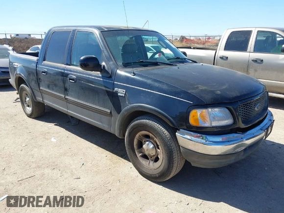 2003 Ford F-150 XLT with VIN 1FTRW07L83KC62296, listed as a IAAI auction lot 41689891 with 272,210 mi miles. Bid and sale history available at carsss.com. Image 1.