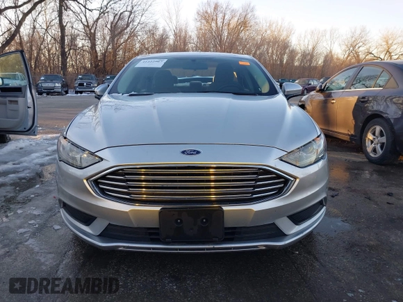2018 Ford Fusion SE z VIN 3FA6P0LU4JR269064, wystawiony jako IAAI lot #41222967 z przebiegiem 115 077 mil mil oraz . Historia ofert i sprzedaży dostępna na DreamBid. Obrazek 13.