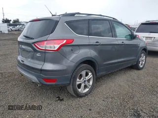 2013 Ford Escape SE with VIN 1FMCU9GX4DUB84247, listed as a IAAI auction lot 40427032 with 201,151 mi miles. Bid and sale history available at carsss.com. Image 4.