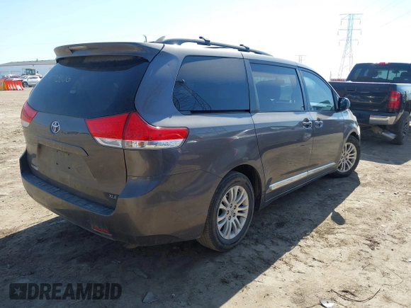 2012 Toyota Sienna XLE AAS with VIN 5TDYK3DC9CS227319, listed as a IAAI auction lot 41773806 with 178,803 mi miles and . Bid and sale history available at carsss.com. Image 4.