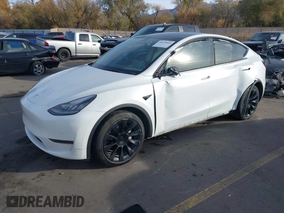 2021 Tesla Model Y Long Range with VIN 5YJYGDEE3MF098586, listed as a IAAI auction lot 40939802 with Not Provided miles and . Bid and sale history available at DreamBid. Image 2.