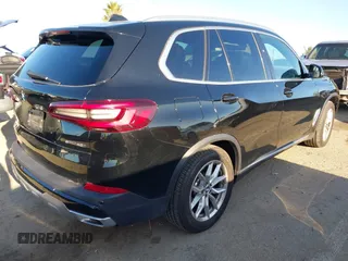2023 BMW X5 sDrive40i with VIN 5UXCR4C01P9R58557, listed as a IAAI auction lot 41826741 with 10,142 mi miles. Bid and sale history available at carsss.com. Image 4.
