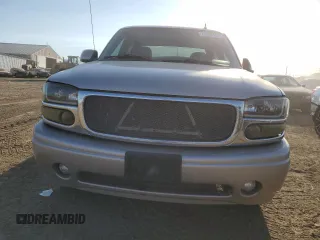2006 GMC Sierra Denali z VIN 2GTEK63N561121615, wystawiony jako Copart lot #73488154 z przebiegiem 197 788 mil mil oraz Szkody całkowita. Historia ofert i sprzedaży dostępna na DreamBid. Obrazek 5.
