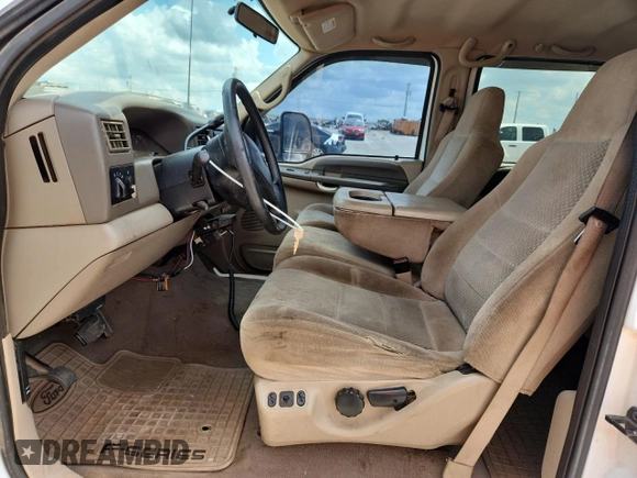 2002 Ford F-250 XL with VIN 1FTNW20F32EA27266, listed as a Copart auction lot 63110855 with 265,546 mi miles and Salvage title. Bid and sale history available at DreamBid. Image 7.