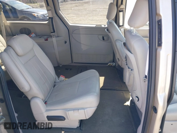 2006 Chrysler Town & Country Touring with VIN 2A8GP54L06R727898, listed as a IAAI auction lot 41893586 with 119,296 mi miles and . Bid and sale history available at DreamBid. Image 8.