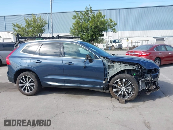 2021 Volvo XC60 Inscription Expression with VIN YV4BR0DL5M1820896, listed as a IAAI auction lot 42207370 with 58,670 mi miles and . Bid and sale history available at DreamBid. Image 13.