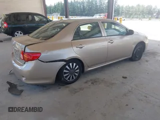 2009 Toyota Corolla with VIN 1NXBU40E79Z049147, listed as a IAAI auction lot 42654211 with 144,504 mi miles and . Bid and sale history available at DreamBid. Image 4.