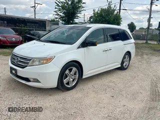 2011 Honda Odyssey Touring с VIN 5FNRL5H92BB008426, выставлен на аукционе Copart как лот 59419585 с пробегом 245 087 миль миль и Чистый • Clean title. История ставок и продаж доступна на DreamBid. Изображение 2.