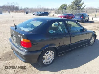 1998 BMW 3 Series 318tiA with VIN WBACG8321WKC84286, listed as a IAAI auction lot 41789161 with 177,827 mi miles. Bid and sale history available at carsss.com. Image 4.