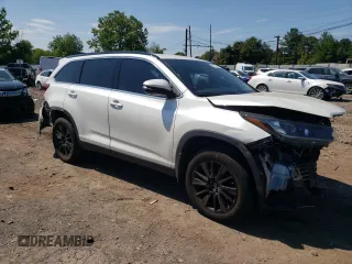2019 Toyota Highlander SE with VIN 5TDJZRFH8KS604858, listed as a Copart auction lot 69157044 with 119,902 mi miles and Salvage title. Bid and sale history available at DreamBid. Image 4.