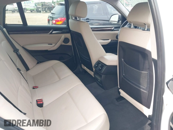 2015 BMW X4 xDrive28i with VIN 5UXXW3C51F0M86668, listed as a IAAI auction lot 42489071 with 59,694 mi miles and . Bid and sale history available at DreamBid. Image 8.