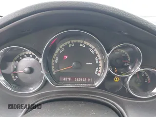 2009 Pontiac G6 1SB z VIN 1G2ZJ57B994252266, wystawiony jako IAAI lot #41609938 z przebiegiem 162 412 mil mil oraz . Historia ofert i sprzedaży dostępna na DreamBid. Obrazek 7.
