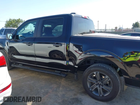 2023 Ford F-150 XL z VIN 1FTEW1C80PKD24124, wystawiony jako IAAI lot #42356966 z przebiegiem 52 104 mil mil oraz . Historia ofert i sprzedaży dostępna na DreamBid. Obrazek 14.