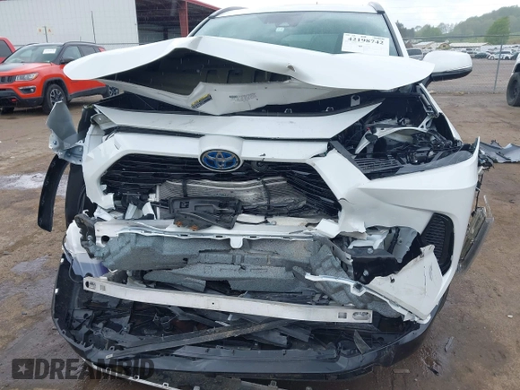 2024 Toyota RAV4 Hybrid SE with VIN 2T3T6RFV3RW066117, listed as a IAAI auction lot 42198742 with 12,352 mi miles and . Bid and sale history available at DreamBid. Image 6.