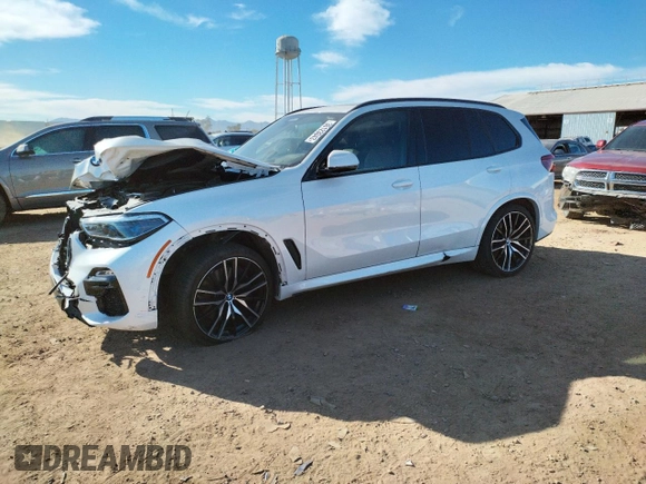 2020 BMW X5 M50i with VIN 5UXJU4C00L9B77869, listed as a Copart auction lot 36123043 with 27,195 mi miles. Bid and sale history available at carsss.com. Image 1.