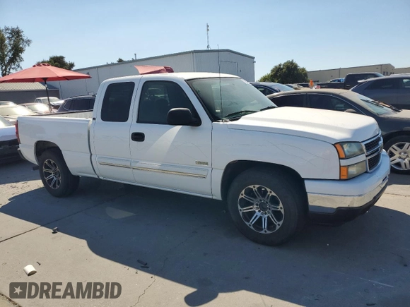 2006 Chevrolet Silverado 1500 LT1 with VIN 1GCEC19T16Z137825, listed as a Copart auction lot 70054844 with 64,477 mi miles and Salvage Title. Bid and sale history available at DreamBid. Image 4.