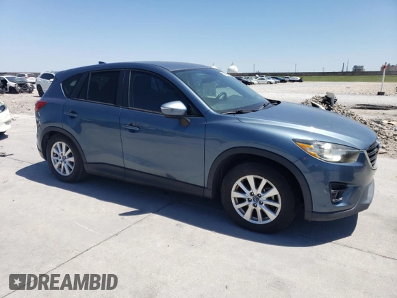 2016 Mazda CX-5 Touring with VIN JM3KE2CY3G0635643, listed as a Copart auction lot 52949105 with 179,464 mi miles and Clean Title. Bid and sale history available at carsss.com. Image 4.