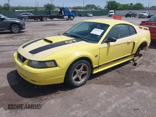 2003 Ford Mustang GT Deluxe z VIN 1FAFP42X43F394679, wystawiony jako IAAI lot #42129223 z przebiegiem 135 472 mil mil oraz . Historia ofert i sprzedaży dostępna na DreamBid. Obrazek 18.