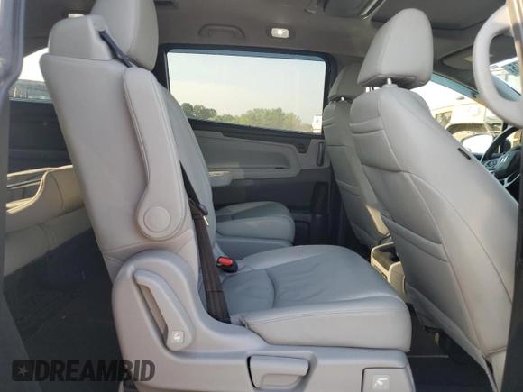2018 Honda Odyssey Touring с VIN 5FNRL6H83JB009998, выставлен на аукционе Copart как лот 60616695 с пробегом 101 880 миль миль и Списание • Salvage title. История ставок и продаж доступна на DreamBid. Изображение 11.