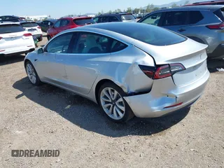 2018 Tesla Model 3 Long Range Battery with VIN 5YJ3E1EB5JF100578, listed as a IAAI auction lot 41959766 with 57,931 mi miles and . Bid and sale history available at DreamBid. Image 3.