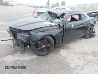 2013 Chevrolet Camaro LT z VIN 2G1FB1E3XD9142079, wystawiony jako IAAI lot #42260678 z przebiegiem 120 292 mil mil oraz . Historia ofert i sprzedaży dostępna na DreamBid. Obrazek 2.