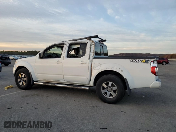 2015 Nissan Frontier S with VIN 1N6AD0EV7FN728470, listed as a Copart auction lot 81985474 with 62,004 mi miles and Salvage title. Bid and sale history available at DreamBid. Image 2.