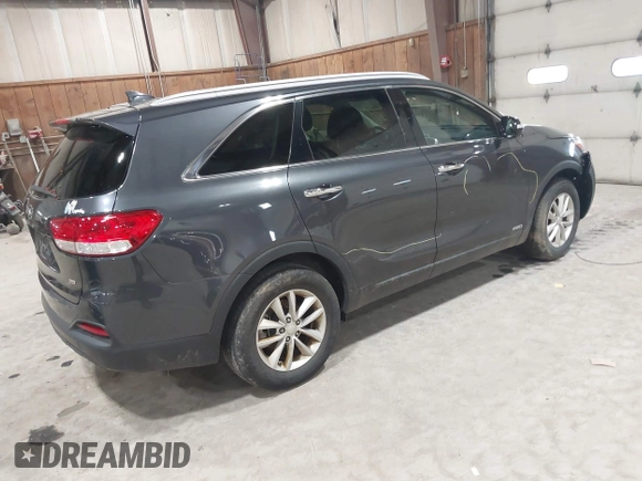 2016 Kia Sorento LX with VIN 5XYPGDA39GG170291, listed as a IAAI auction lot 42045883 with 136,848 mi miles. Bid and sale history available at carsss.com. Image 4.