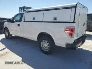 2014 Ford F-150 XL with VIN 1FTMF1CM4EKD33317, listed as a Copart auction lot 50059765 with 188,709 mi miles and Salvage title. Bid and sale history available at DreamBid. Image 2.