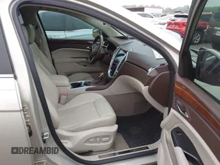 2016 Cadillac SRX Luxury Collection z VIN 3GYFNBE35GS566047, wystawiony jako IAAI lot #42201964 z przebiegiem 72 887 mil mil oraz . Historia ofert i sprzedaży dostępna na DreamBid. Obrazek 5.