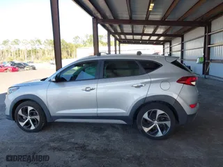 2017 Hyundai Tucson Value with VIN KM8J33A27HU418441, listed as a IAAI auction lot 41812422 with 111,406 mi miles. Bid and sale history available at carsss.com. Image 14.