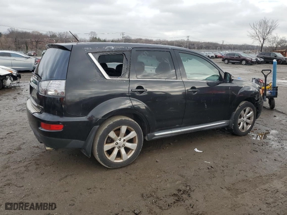 2010 Mitsubishi Outlander GT with VIN JA4JT5AX1AZ014100, listed as a Copart auction lot 85090004 with 221,802 mi miles and Salvage Title. Bid and sale history available at carsss.com. Image 3.