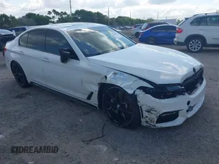 2018 BMW 5 Series 540i with VIN WBAJE5C50JWA95412, listed as a IAAI auction lot 41502258 with 74,150 mi miles and . Bid and sale history available at carsss.com. Image 1.