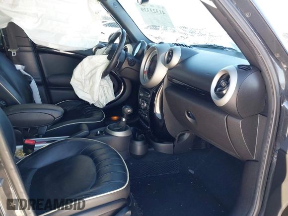 2011 MINI Countryman S with VIN WMWZC5C50BWL55234, listed as a IAAI auction lot 41323339 with 134,709 mi miles and . Bid and sale history available at DreamBid. Image 5.