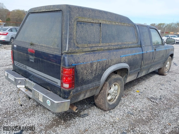 1995 Dodge Dakota with VIN 1B7GL23X0SS266233, listed as a IAAI auction lot 41864191 with 199,159 mi miles. Bid and sale history available at carsss.com. Image 4.