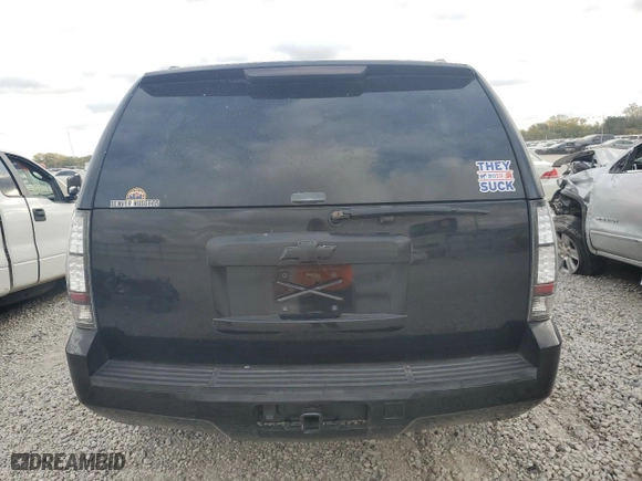 2009 Chevrolet Suburban LT w/2LT with VIN 1GNFK263X9R278809, listed as a Copart auction lot 77856924 with 139,744 mi miles and Salvage Title. Bid and sale history available at carsss.com. Image 6.