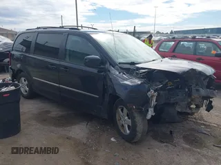2010 Dodge Grand Caravan SXT with VIN 2D4RN5D13AR427353, listed as a IAAI auction lot 42180594 with 191,535 mi miles and . Bid and sale history available at DreamBid. Image 1.