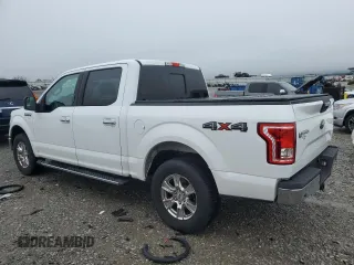 2015 Ford F-150 XLT with VIN 1FTEW1EFXFFB81265, listed as a Copart auction lot 51841715 with 122,771 mi miles and Salvage Title. Bid and sale history available at carsss.com. Image 2.
