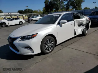 2016 Lexus ES 300h Hybrid with VIN JTHBW1GG2G2106768, listed as a Copart auction lot 67907943 with 69,544 mi miles. Bid and sale history available at carsss.com. Image 1.