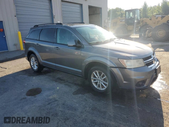 2013 Dodge Journey SXT with VIN 3C4PDCBG0DT522408, listed as a Copart auction lot 62699195 with 130,665 mi miles and Salvage title. Bid and sale history available at DreamBid. Image 4.
