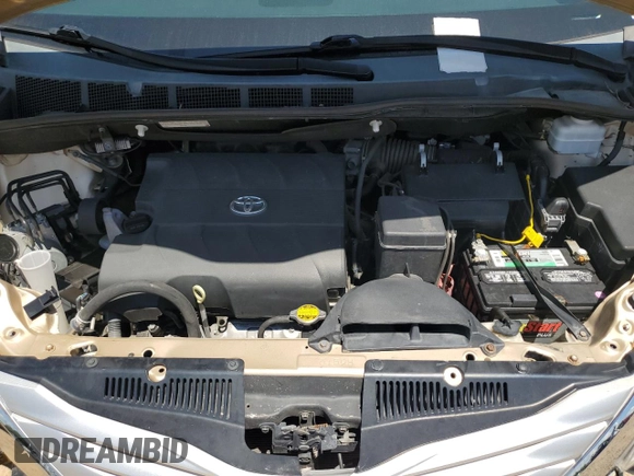 2014 Toyota Sienna XLE with VIN 5TDYK3DC8ES414814, listed as a Copart auction lot 64577875 with 111,675 mi miles and Salvage title. Bid and sale history available at DreamBid. Image 12.