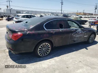 2012 BMW 7 Series 740i with VIN WBAKA4C59CDS99342, listed as a Copart auction lot 63705894 with 0 mi miles and Salvage Title. Bid and sale history available at carsss.com. Image 3.